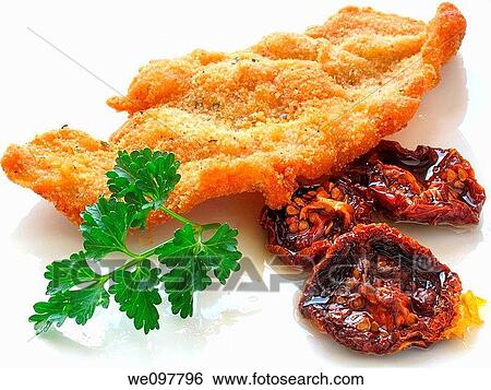 Breaded steak with sundried tomato and olive oil View Large Photo Image Stock Photograph - Breaded steak with sundried tomato and olive oil. Fotosearch