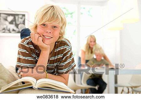 brother, blond, boy, book, blue eyes, at-home View Large Photo Image Stock Photo - brother, blond, boy, book, blue eyes, at-home. Fotosearch