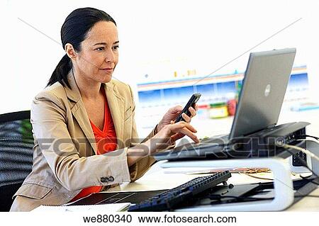 Stock Image - brunette, business, businesspeople, businesswoman. Fotosearch