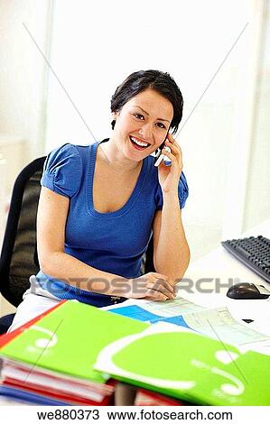 Stock Image - brunette, business, businesspeople, businesswoman, calling. Fotosearch