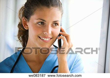 brunette, calling, cell phone, Close-up View Large Photo Image Stock Photo - brunette, calling, cell phone, Close-up. Fotosearch