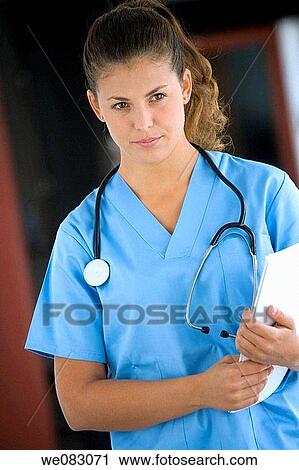 Stock Image - brunette, dark hair, doctor. Fotosearch
