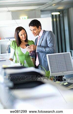 Stock Photo - business, businessman, businesspeople, cell phone. Fotosearch