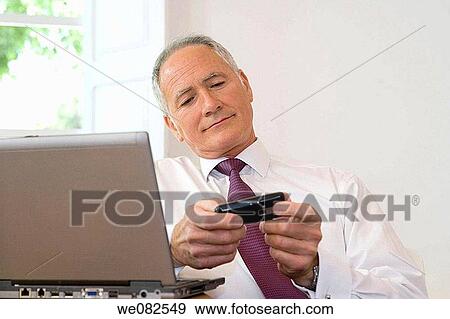business, businessman, businesspeople, cell phone View Large Photo Image Stock Photo - business, businessman, businesspeople, cell phone. Fotosearch