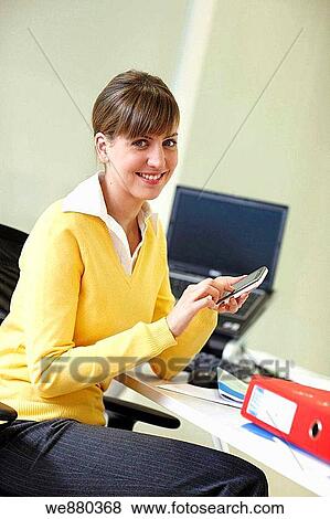 business, businesspeople, businesswoman, cell phone View Large Photo Image Stock Photo - business, businesspeople, businesswoman, cell phone. Fotosearch