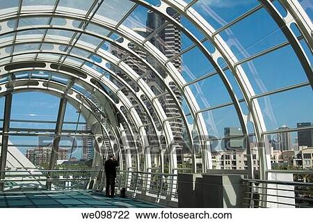 Business Man Making Phone Call In Hallway With Curved Glass Ceiling In San Diego Convention Center San Diego California Usa Stock Image