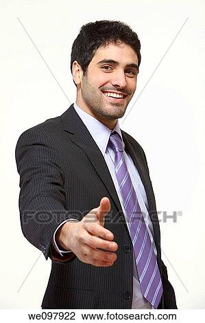 Business man offering handshake on white background View Large Photo Image Stock Image - Business man offering handshake on white background. Fotosearch