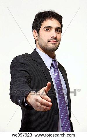 Business man offering handshake on white background View Large Photo Image Stock Image - Business man offering handshake on white background. Fotosearch