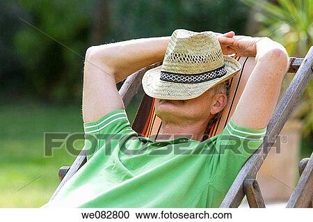 Stock Image - calm, chilling out, Arms raised. Fotosearch