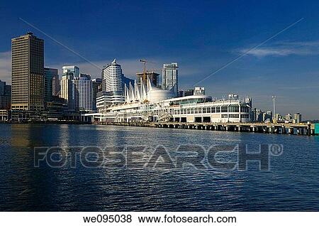 Canada Place sails floating on pilons and Vancouver waterfront with downtown high rise towers View Large Photo Image Stock Photo - Canada Place sails floating on pilons and Vancouver waterfront with downtown high rise towers. Fotosearch