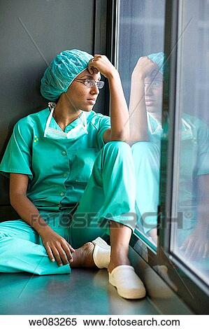Stock Photography - cap, day, concern, absorbed. Fotosearch