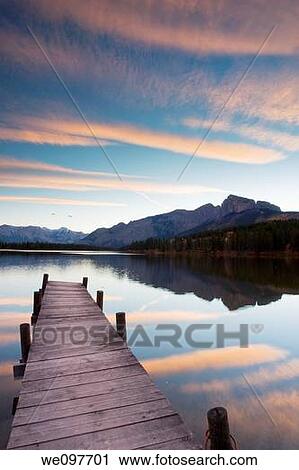catwalk at mountain lake after sunset View Large Photo Image Stock Image - catwalk at mountain lake after sunset. Fotosearch