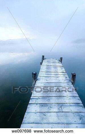 catwalk leading onto lake, sad mood View Large Photo Image Stock Photo - catwalk leading onto lake, sad mood. Fotosearch