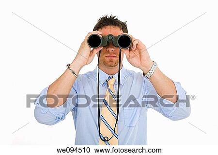 Caucasian businessman in a shirt and tie looking throught a pair of binoculars View Large Photo Image Stock Image - Caucasian businessman in a shirt and tie looking throught a pair of binoculars. Fotosearch