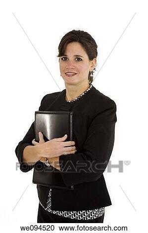 Caucasian businesswoman setting smiling while standing on a white background View Large Photo Image Stock Image - Caucasian businesswoman setting smiling while standing on a white background. Fotosearch