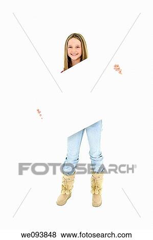 Caucasian child holding a blank sign so you can add your own advertising slogan She is on a white background View Large Photo Image Stock Photo - Caucasian child holding a blank sign so you can add your own advertising slogan She is on a white background. Fotosearch
