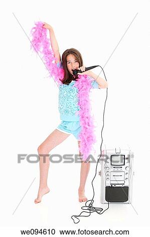 Caucasian children singing karaoke on a white background View Large Photo Image Stock Image - Caucasian children singing karaoke on a white background. Fotosearch