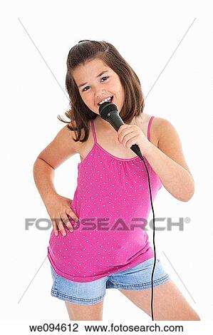 Caucasian children singing karaoke on a white background View Large Photo Image Stock Image - Caucasian children singing karaoke on a white background. Fotosearch
