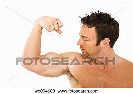 Caucasian man flexing his arm muscule after a working out on a white background View Large Photo Image Stock Photo - Caucasian man flexing his arm muscule after a working out on a white background. Fotosearch