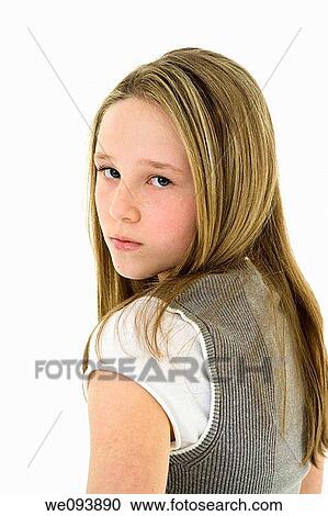 Caucasian preteen girl displaying some attitude while looking over shoulder View Large Photo Image Stock Image - Caucasian preteen girl displaying some attitude while looking over shoulder. Fotosearch