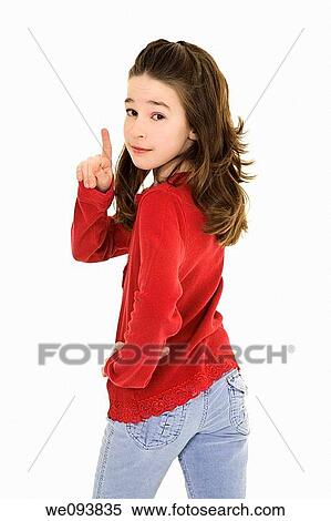 Caucasian preteen using her finger to display some attitude View Large Photo Image Stock Photography - Caucasian preteen using her finger to display some attitude. Fotosearch