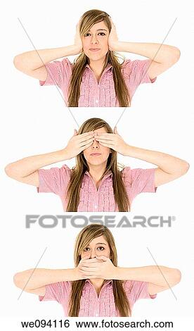 Stock Photograph - Caucasian teenager displaying some attitude with the Hear No Evil, See No Evil, Speak No Evil hand gestures. Fotosearch
