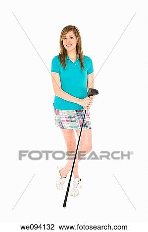 Caucasian teenager posing with golf club on white background View Large Photo Image Stock Image - Caucasian teenager posing with golf club on white background. Fotosearch