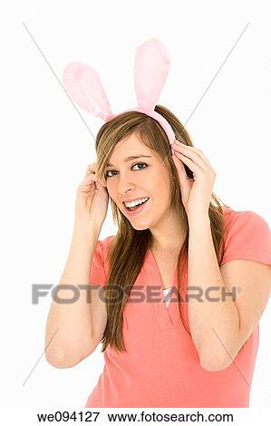caucasian teenager wear rabbit ears and acting silly View Large Photo Image Stock Photo - caucasian teenager wear rabbit ears and acting silly. Fotosearch