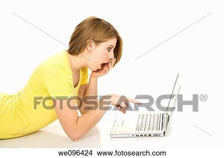 Caucasian teenager woking on laptop computer View Large Photo Image Picture - Caucasian teenager woking on laptop computer. Fotosearch