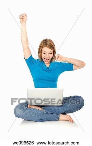 Caucasian teenager woking on laptop computer View Large Photo Image Stock Photograph - Caucasian teenager woking on laptop computer. Fotosearch
