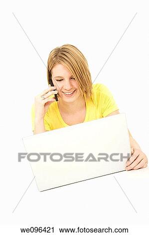 Caucasian teenager working on a laptop computer View Large Photo Image Stock Image - Caucasian teenager working on a laptop computer. Fotosearch