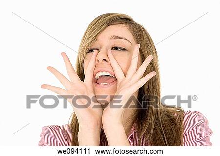 Caucasian teenager yelling at something on white background View Large Photo Image Stock Image - Caucasian teenager yelling at something on white background. Fotosearch