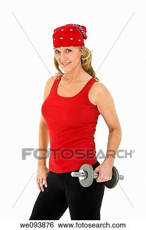 Caucasian woman in early 40s lifting weights using a dumbbell on a white background View Large Photo Image Stock Photograph - Caucasian woman in early 40s lifting weights using a dumbbell on a white background. Fotosearch