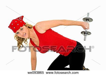 Caucasian woman in early 40s lifting weights using a dumbbell on a white background View Large Photo Image Stock Photography - Caucasian woman in early 40s lifting weights using a dumbbell on a white background. Fotosearch