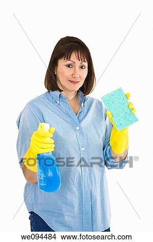 Caucasian woman in early 40s with cleaning supplies on white background View Large Photo Image Picture - Caucasian woman in early 40s with cleaning supplies on white background. Fotosearch
