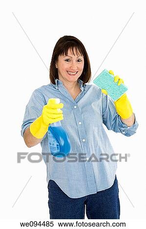 Caucasian woman in early 40s with cleaning supplies on white background View Large Photo Image Stock Photography - Caucasian woman in early 40s with cleaning supplies on white background. Fotosearch