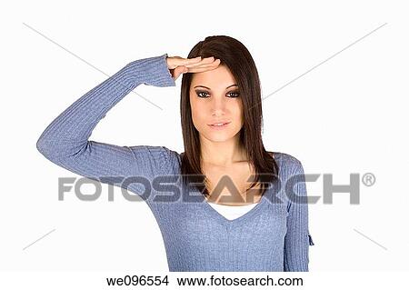 Caucasian woman saluting on a white background View Large Photo Image Picture - Caucasian woman saluting on a white background. Fotosearch