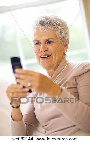 cell phone, communication, at-home View Large Photo Image Picture - cell phone, communication, at-home. Fotosearch
