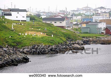 Cemetery and houses on the waterfront shores of Port aux Basques Newfoundland harbour View Large Photo Image Stock Image - Cemetery and houses on the waterfront shores of Port aux Basques Newfoundland harbour. Fotosearch