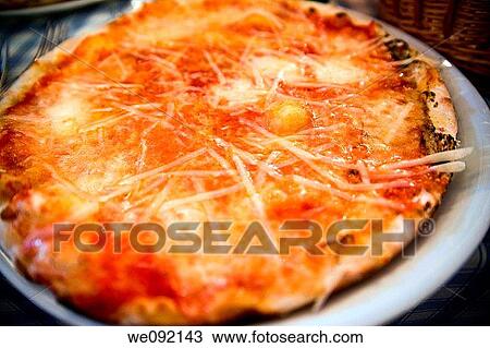Cheese and tomato sauce pizza close up View Large Photo Image Stock Image - Cheese and tomato sauce pizza close up. Fotosearch