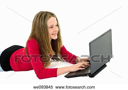 Child laying on a white background working on laptop computer View Large Photo Image Stock Photography - Child laying on a white background working on laptop computer. Fotosearch