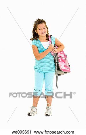 Child standing on a white background holding a school backpack View Large Photo Image Stock Image - Child standing on a white background holding a school backpack. Fotosearch