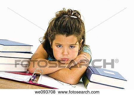 Stock Photo - Child very up set while working on homework on white background. Fotosearch