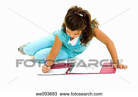 Stock Image - Child working on homework on white background. Fotosearch