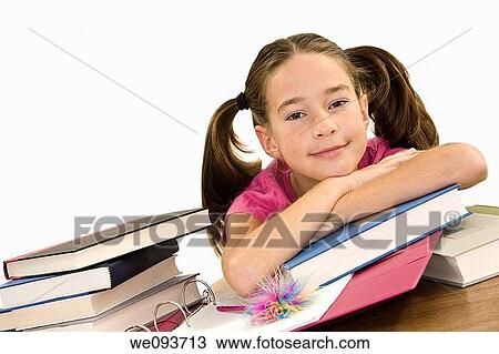 Child working on homework on white background View Large Photo Image Stock Image - Child working on homework on white background. Fotosearch