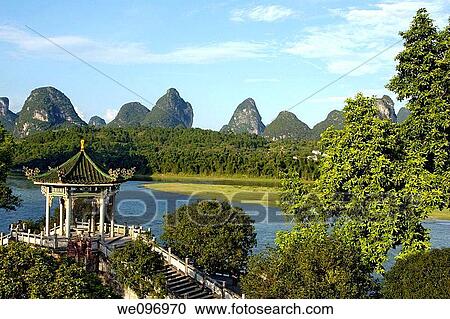 China guangxi yangshuo a typical pavilion on li river at sunset View Large Photo Image Stock Image - China guangxi yangshuo a typical pavilion on li river at sunset. Fotosearch