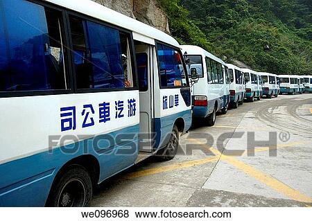 Stock Photo - China shaanxi a line of similar buses parked at the hua shan sacred mountain situated 120 kms east from xian. Fotosearch