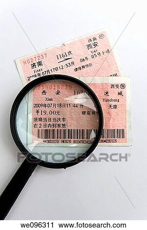 Chinese tickets with a magnifying glass View Large Photo Image Stock Image - Chinese tickets with a magnifying glass. Fotosearch