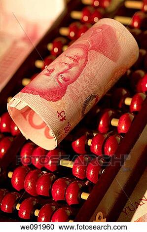 Chinese yuan notes rolled up on abacus View Large Photo Image Stock Image - Chinese yuan notes rolled up on abacus. Fotosearch