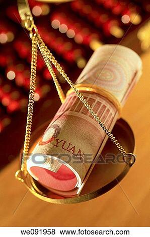 Chinese yuan notes rolled up on weighing balance View Large Photo Image Stock Photo - Chinese yuan notes rolled up on weighing balance. Fotosearch